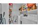Functional laundry room area including both a washer and dryer, ensuring efficient chore management at 1019 Milner E Dr, Lakeland, FL 33810