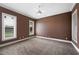 Bedroom with carpet, ceiling fan, and natural light from windows at 105 Woden Way, Winter Haven, FL 33884