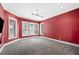 Bedroom featuring a ceiling fan, carpeted floors, and natural lighting at 105 Woden Way, Winter Haven, FL 33884
