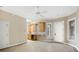 A bonus room featuring a kitchenette, ceiling fan, and natural light at 105 Woden Way, Winter Haven, FL 33884