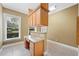 Home office featuring built-in desk, cabinetry, and a bright window view at 105 Woden Way, Winter Haven, FL 33884