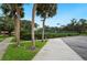 Well-maintained tennis court offering residents an active and enjoyable recreational amenity at 105 Woden Way, Winter Haven, FL 33884