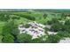 Aerial view showcasing the golf course and community buildings at 1102 Eagle Pond Dr # 1102, Winter Haven, FL 33884