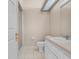 Neutral bathroom featuring a single sink vanity and a tiled shower space at 1102 Eagle Pond Dr # 1102, Winter Haven, FL 33884