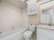 Functional bathroom featuring a tub, toilet, vanity, and mirror, providing essential amenities at 1102 Eagle Pond Dr # 1102, Winter Haven, FL 33884