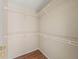 Walk-in closet equipped with multiple shelves for organization and storage at 1102 Eagle Pond Dr # 1102, Winter Haven, FL 33884