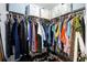 Walk-in closet with ample hanging space and shelving for organization at 124 Eagle Point Blvd, Auburndale, FL 33823