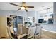 Charming dining area adjacent to the kitchen, featuring a wooden table with seating for four and natural light at 124 Eagle Point Blvd, Auburndale, FL 33823