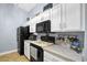 Bright kitchen with white cabinetry and modern appliances at 124 Eagle Point Blvd, Auburndale, FL 33823