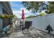 Outdoor patio with dining set perfect for relaxing and entertaining at 124 Eagle Point Blvd, Auburndale, FL 33823