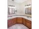 Comfortable bathroom with a soaker tub, glass shower, and dual sinks at 15 Edwards Shrs, Haines City, FL 33844