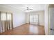 Bright bedroom with wood laminate flooring and a ceiling fan at 15 Edwards Shrs, Haines City, FL 33844