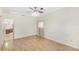 Bright bedroom with wood laminate flooring and a ceiling fan at 15 Edwards Shrs, Haines City, FL 33844