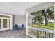 Cozy front porch with chairs, providing a comfortable spot to enjoy the view at 15 Edwards Shrs, Haines City, FL 33844