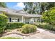 A lovely single story home with lush landscaping, and mature trees at 15 Edwards Shrs, Haines City, FL 33844