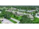 This is an aerial view of the community with green landscaping at 1507 Eagle Pond Dr # 1507, Winter Haven, FL 33884