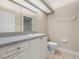 Bathroom with a granite countertop vanity, shower, and tile flooring at 1507 Eagle Pond Dr # 1507, Winter Haven, FL 33884