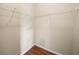 Spacious walk-in closet featuring wire shelving and durable flooring at 1507 Eagle Pond Dr # 1507, Winter Haven, FL 33884