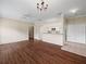 Open floor plan featuring dark wood flooring, kitchen, and living room at 1507 Eagle Pond Dr # 1507, Winter Haven, FL 33884