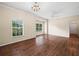 Bright living room featuring large windows, dark wood flooring and natural light at 1507 Eagle Pond Dr # 1507, Winter Haven, FL 33884