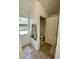 Bathroom features a toilet and towels hanging on hooks at 1790 Turtle Rock Dr, Lakeland, FL 33803