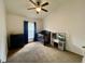 This bedroom is complete with a dark wood crib, dresser, and toy kitchen at 1790 Turtle Rock Dr, Lakeland, FL 33803
