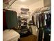 This closet is fully stocked with shelves and storage for clothes, blankets, and shoes at 1790 Turtle Rock Dr, Lakeland, FL 33803