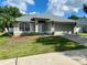 Charming single-story home with a well-manicured lawn and an attached two-car garage at 1790 Turtle Rock Dr, Lakeland, FL 33803