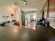 An efficient kitchen layout with warm wood cabinets, stainless steel appliances, and an open design concept at 1790 Turtle Rock Dr, Lakeland, FL 33803