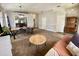 Spacious living area showcasing an open layout and access to the dining area and foyer at 1790 Turtle Rock Dr, Lakeland, FL 33803