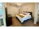 Serene main bedroom with ceiling fan, neutral decor, and attached bathroom at 1790 Turtle Rock Dr, Lakeland, FL 33803