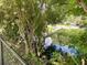 View of a backyard pond showcasing natural surroundings and water feature of the property at 1790 Turtle Rock Dr, Lakeland, FL 33803