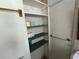 Bathroom linen closet with shelves at 1805 S Lake Reedy Blvd, Frostproof, FL 33843