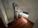 Bathroom with wood floors, walk-in shower, sink, and toilet at 1805 S Lake Reedy Blvd, Frostproof, FL 33843