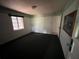 Classic bedroom with a window and doorway to the rest of the home at 1805 S Lake Reedy Blvd, Frostproof, FL 33843