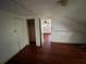 Bedroom with hardwood floors and closet at 1805 S Lake Reedy Blvd, Frostproof, FL 33843