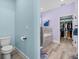 Bathroom features include a glass shower, soaking tub, and closet at 185 St Thomas Dr, Mulberry, FL 33860