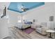 Bright bedroom features recessed lighting, and a comfortable seating area at 185 St Thomas Dr, Mulberry, FL 33860