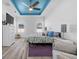 Bright bedroom features recessed lighting, and a comfortable seating area at 185 St Thomas Dr, Mulberry, FL 33860