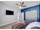 Cozy living room with wood sliding door, modern lighting, and comfortable seating at 185 St Thomas Dr, Mulberry, FL 33860