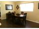Dining room with wooden table and seating for four at 2021 Oliver Pl, Winter Haven, FL 33881