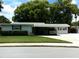 Charming single story home with a well-maintained lawn and covered parking at 2021 Oliver Pl, Winter Haven, FL 33881