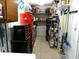 Well-organized storage space with tools, shelving, and various household items at 2021 Oliver Pl, Winter Haven, FL 33881