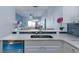 Bright kitchen with white cabinets and breakfast bar at 209 Andros Ave # 15301, Davenport, FL 33897