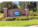 Bahama Bay Resort sign framed by lush greenery, in front of brick wall at 209 Andros Ave # 15301, Davenport, FL 33897