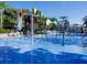 Fun water park featuring colorful buckets and splash features for entertainment and summer fun at 209 Andros Ave # 15301, Davenport, FL 33897