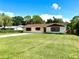 Cozy single-story home with a well-kept front yard, complemented by a concrete driveway at 2159 Greenway Dr, Winter Haven, FL 33881