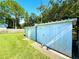 Exterior image of two storage sheds with grass and a concrete walkway at 2159 Greenway Dr, Winter Haven, FL 33881