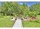 Backyard with outdoor seating area, gazebo and garden at 2252 Fox Run Rd, Lake Wales, FL 33898