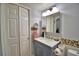 Updated bathroom with stylish vanity, modern fixtures, and great storage space at 2252 Fox Run Rd, Lake Wales, FL 33898